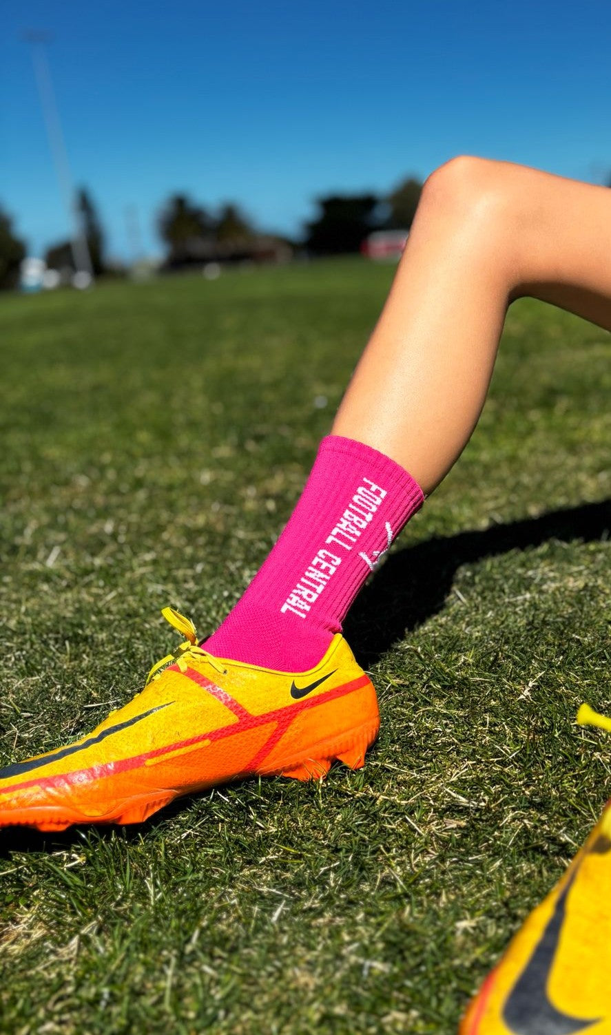 pink grip socks, action image, football grip socks, soccer grip socks