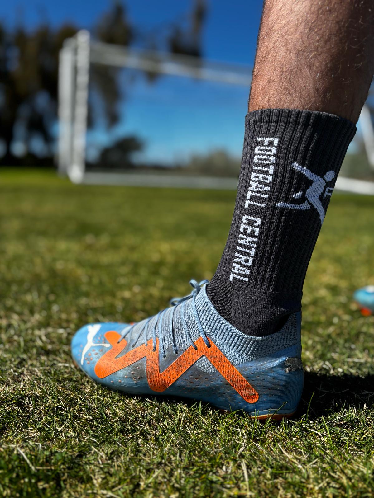 grey grip socks, action image, football grip socks, soccer grip socks