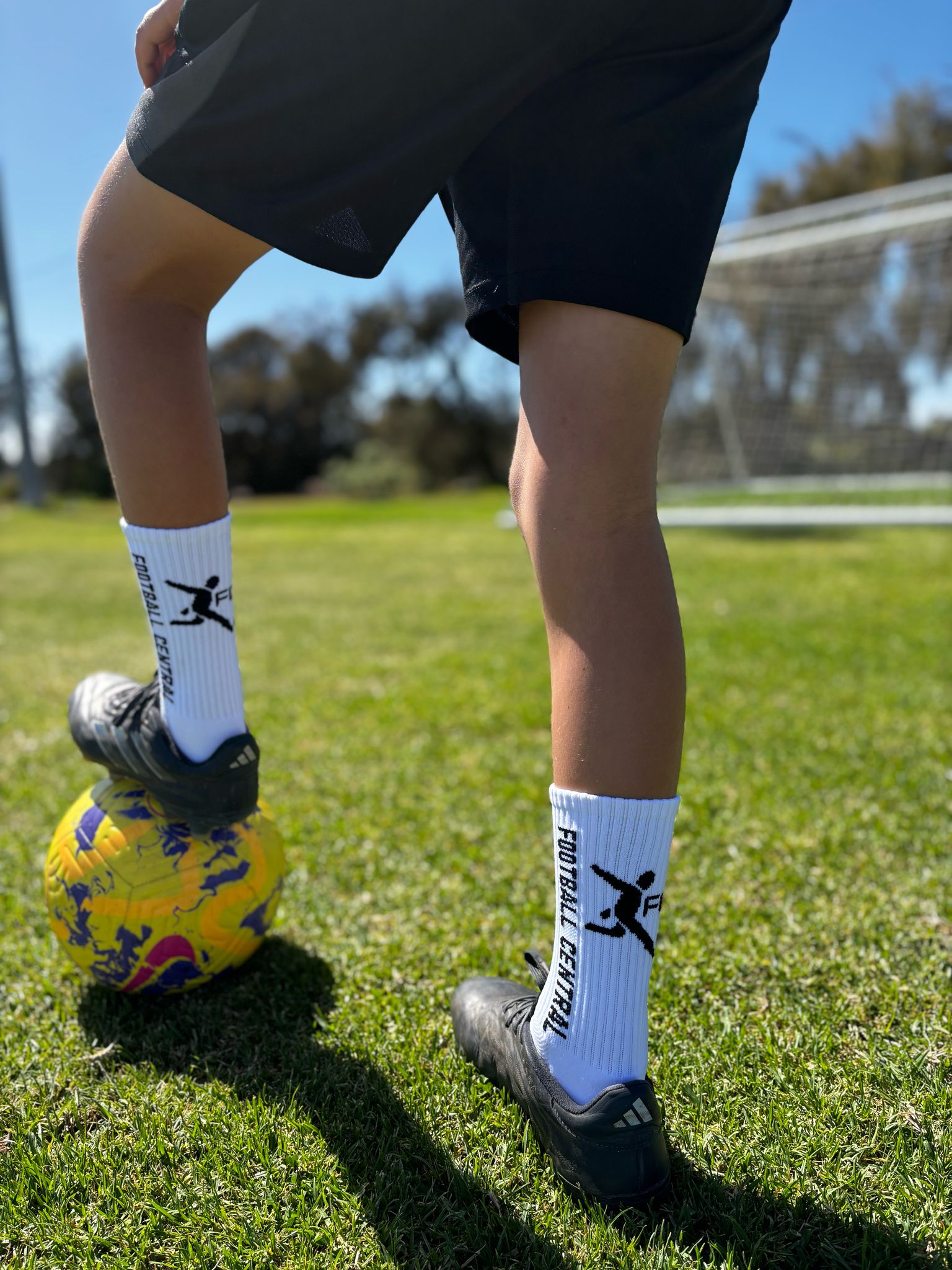 white grip socks, action image, football grip socks, soccer grip socks