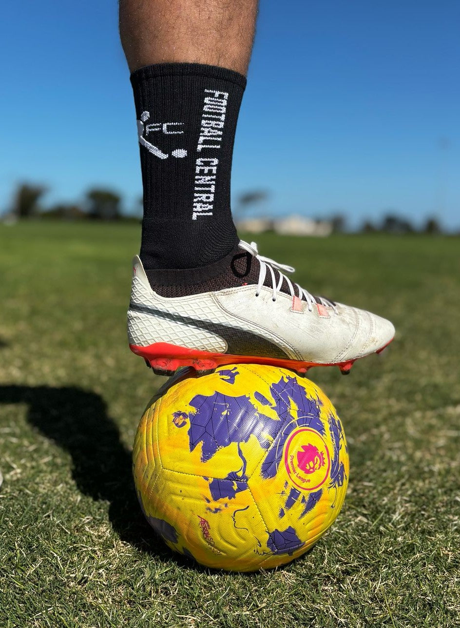 black grip socks, action image, football grip socks, soccer grip socks