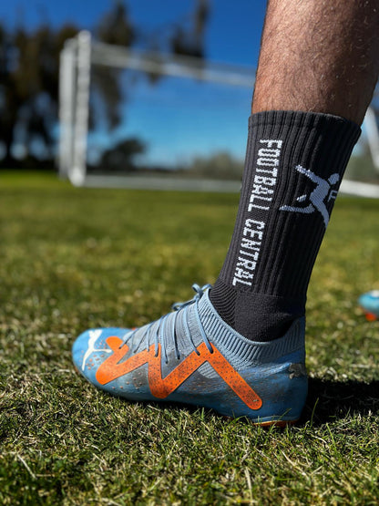 grey grip socks, action image, football grip socks, soccer grip socks